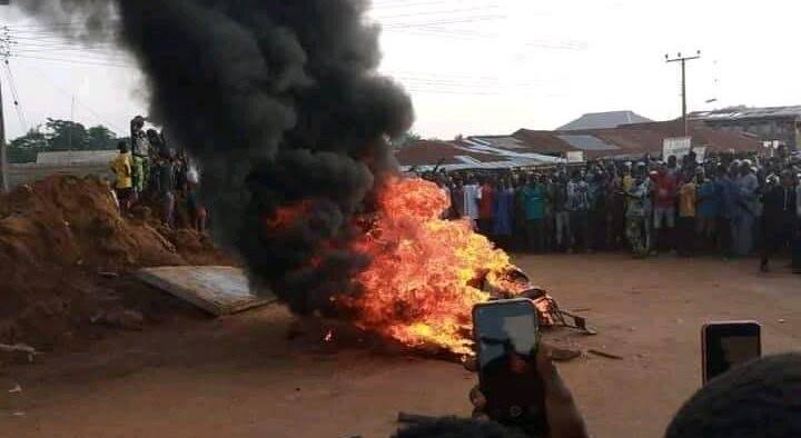 JUST IN: Tension In Kano As Angry Mob Kill Almajiri Who Beheaded A Kid