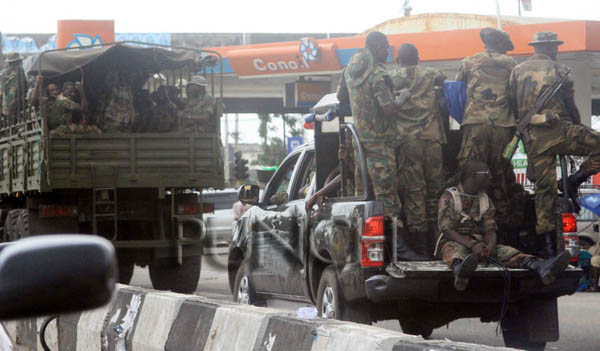 JUST IN: Tension As Over 300 Heavily Armed Soldiers, Police, Others Take Over Venues Of Nationwide Protest